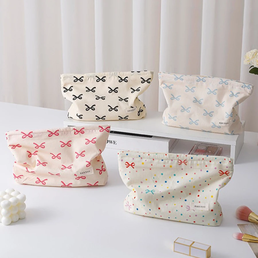 حقيبة مكياج بسحاب مطبوع عليها نمط فيونكة مصممة بشكل بسيط، حقيبة تخزين مستحضرات التجميل خفيفة الوزن ومتعددة الوظائف للنساء