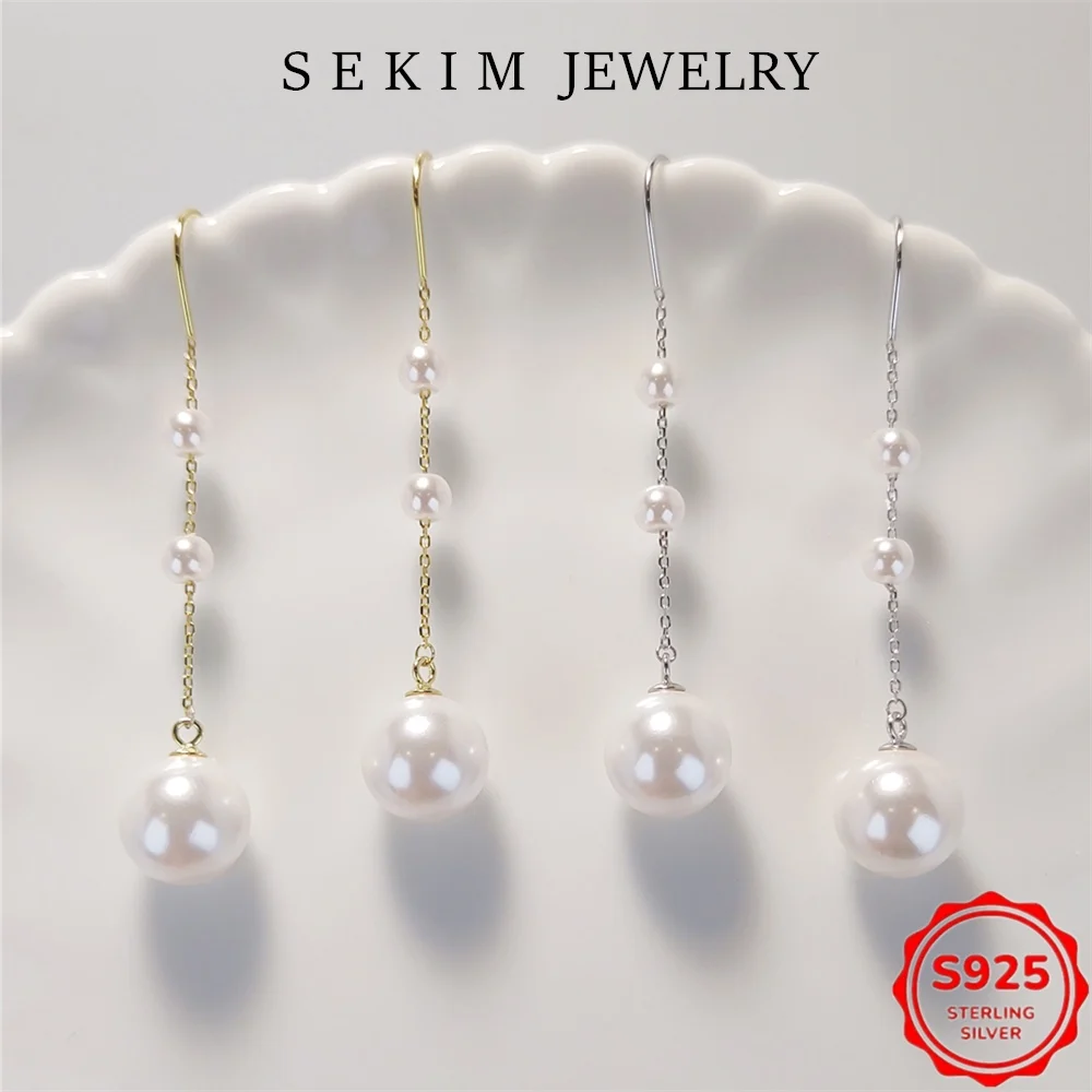 

Модные висячие серьги из стерлингового серебра 925 пробы с блестящим жемчугом-ракушкой - элегантные и гипоаллергенные SER005