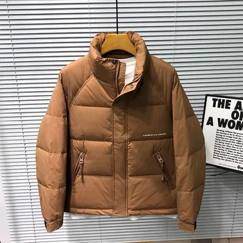 Autunno inverno tinta unita colletto rialzato piumino d'anatra bianco da uomo alla moda piumino caldo addensato atmosferico Streetwear