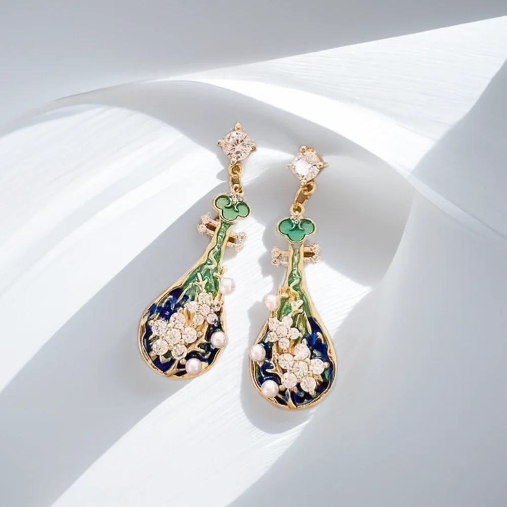 

Plum Blossom and Lute Earrings for women,Van Gogh oil painting style, set with zircon light luxury high-end jewelry.