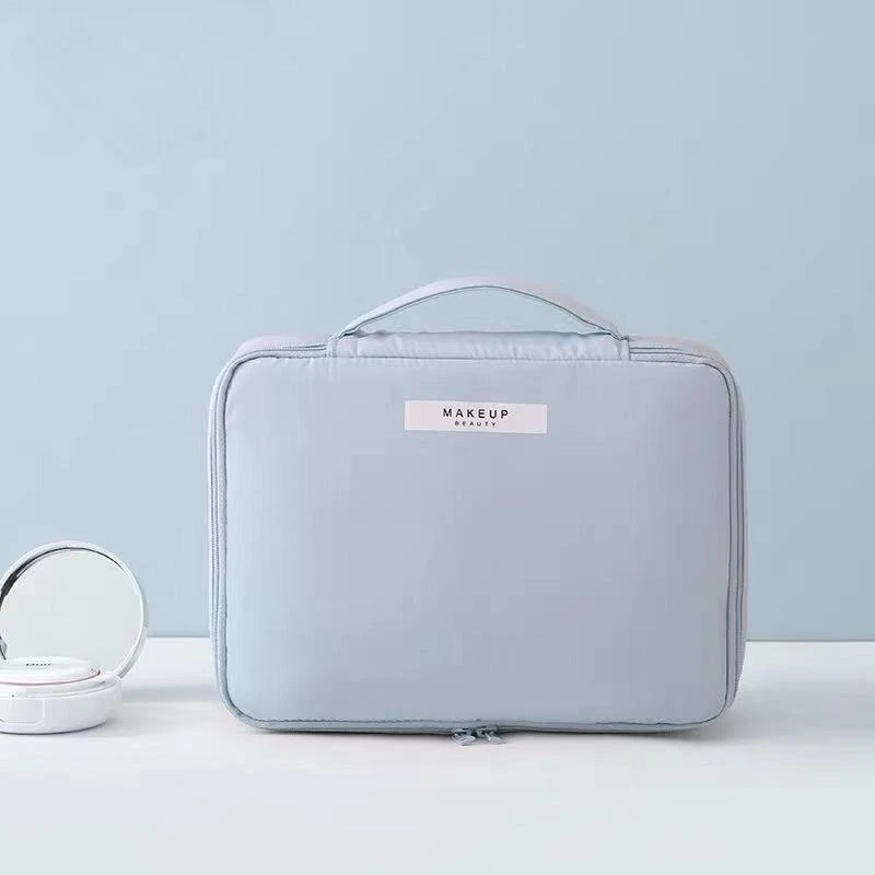حقيبة مستحضرات التجميل المحمولة ذات المظهر العالي للسيدات ذات سعة كبيرة حقيبة غسيل للسفر حقيبة تخزين المكياج ثلاثية الأبعاد