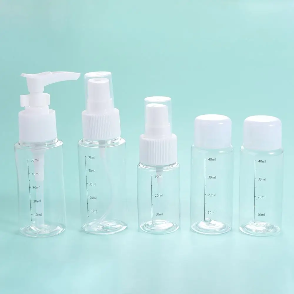 Juego de botellas recargables con bolsa de almacenamiento, subbotella de Gel de ducha, Kit de botellas de maquillaje, bomba de crema facial, botella pulverizadora para mujer, 7 Uds.