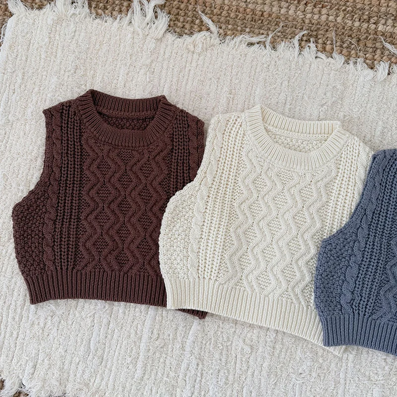 ربيع جديد 2026 ملابس أطفال من عمر 0 إلى 3 سنوات سترة حياكة للأطفال الأولاد والبنات سترة لحديثي الولادة بدون أكمام بلون واحد #2