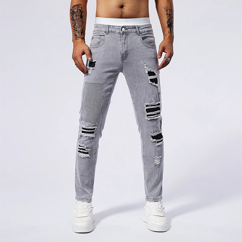 

American high street trend jeans splicing cotton bullet hole stretch Slim small leg pants hundred fashion men's clothing