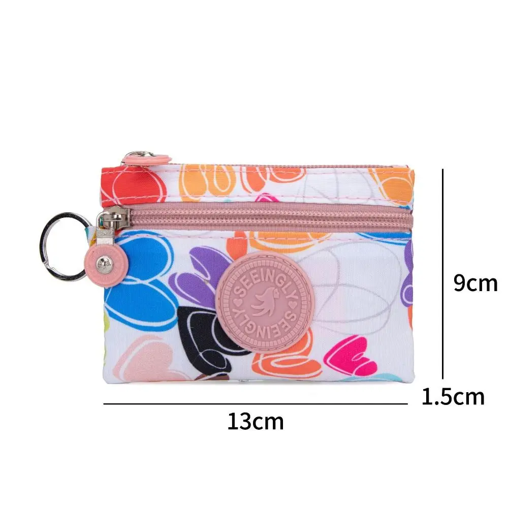 กระเป๋าใส่เหรียญผ้าแคนวาสแบบใหม่พร้อมพวงกุญแจ ลายดอกไม้ ช่องใส่บัตร กันน้ำ ทนทานต่อการสึกหรอ สำหรับผู้ชายและผู้หญิง