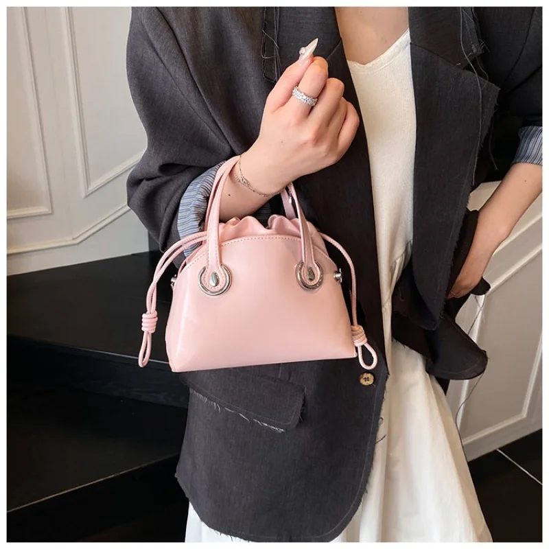 

Верхняя женская большая сумка из кожи со змеиным принтом и парижским принтом. Высококачественная винтажная легкая повседневная сумка. ​