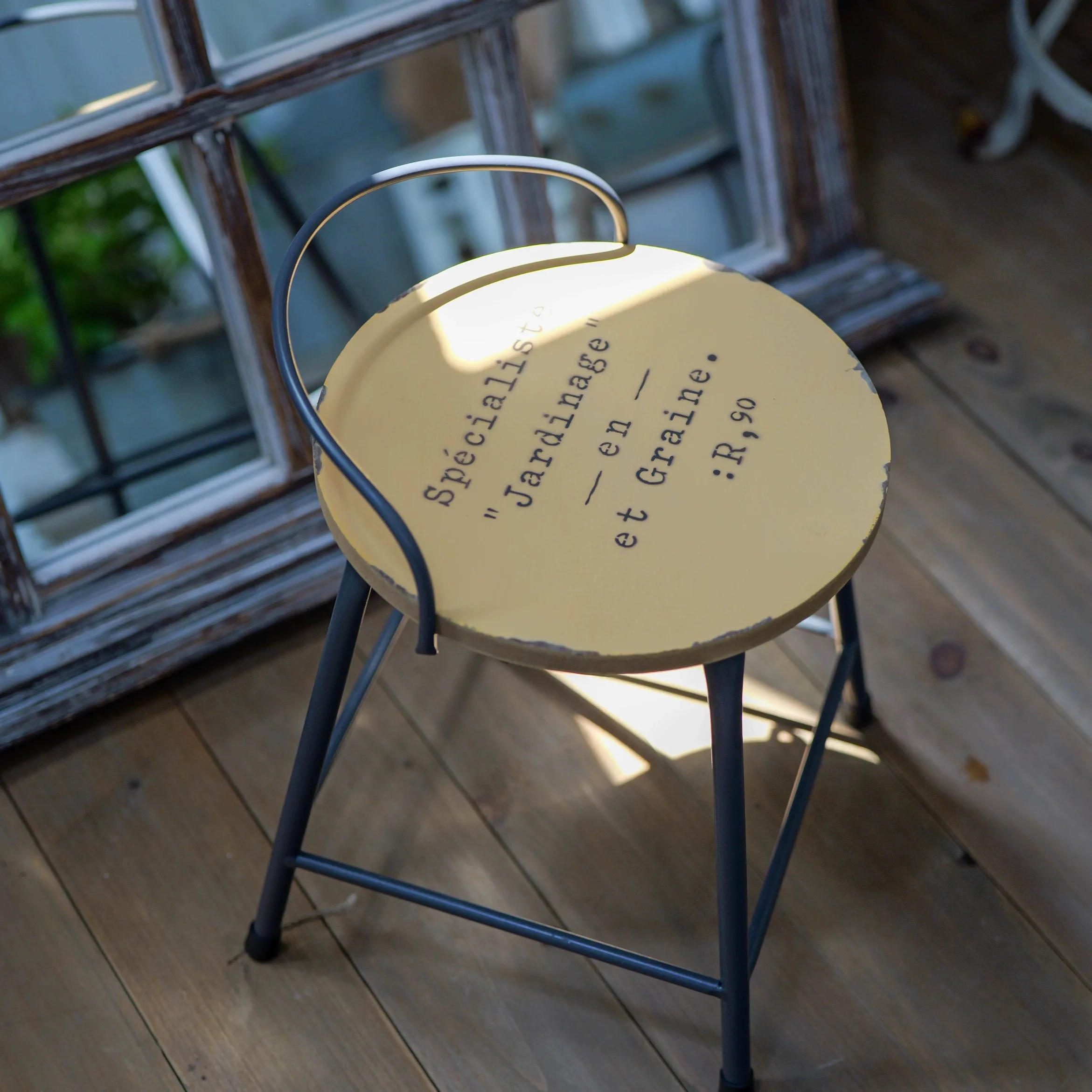 Vintage Round Metal Stool Plant Stand, Cream with French Typography, Iron Frame, 9.8 Inch Diameter, 14 Inch Height