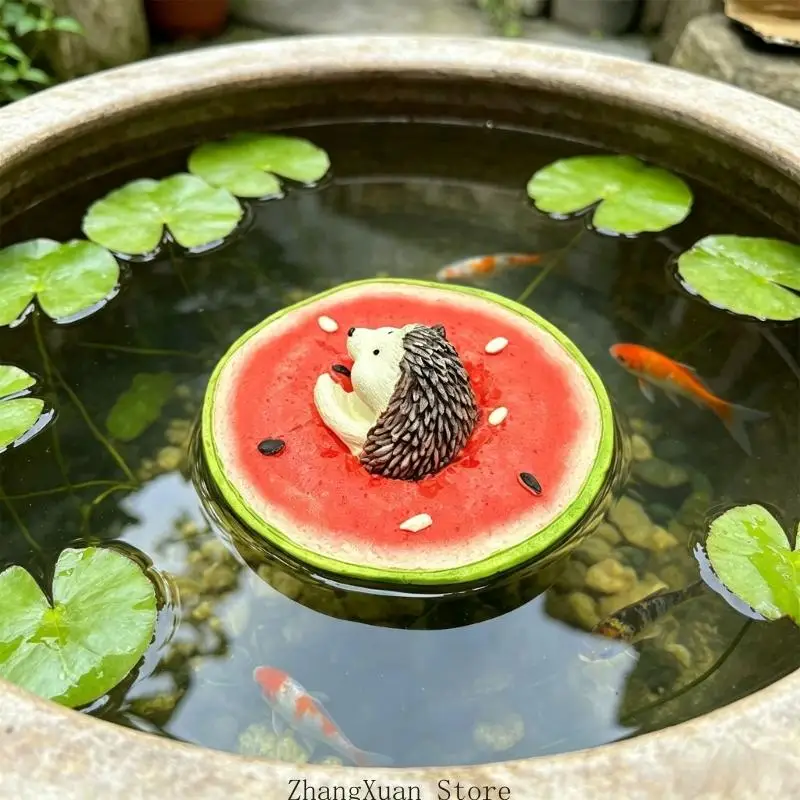 Water Feature Accent Figure with Floating Animal Character on Fruit Base, Finished Single Piece Display for Indoor or Garden Use