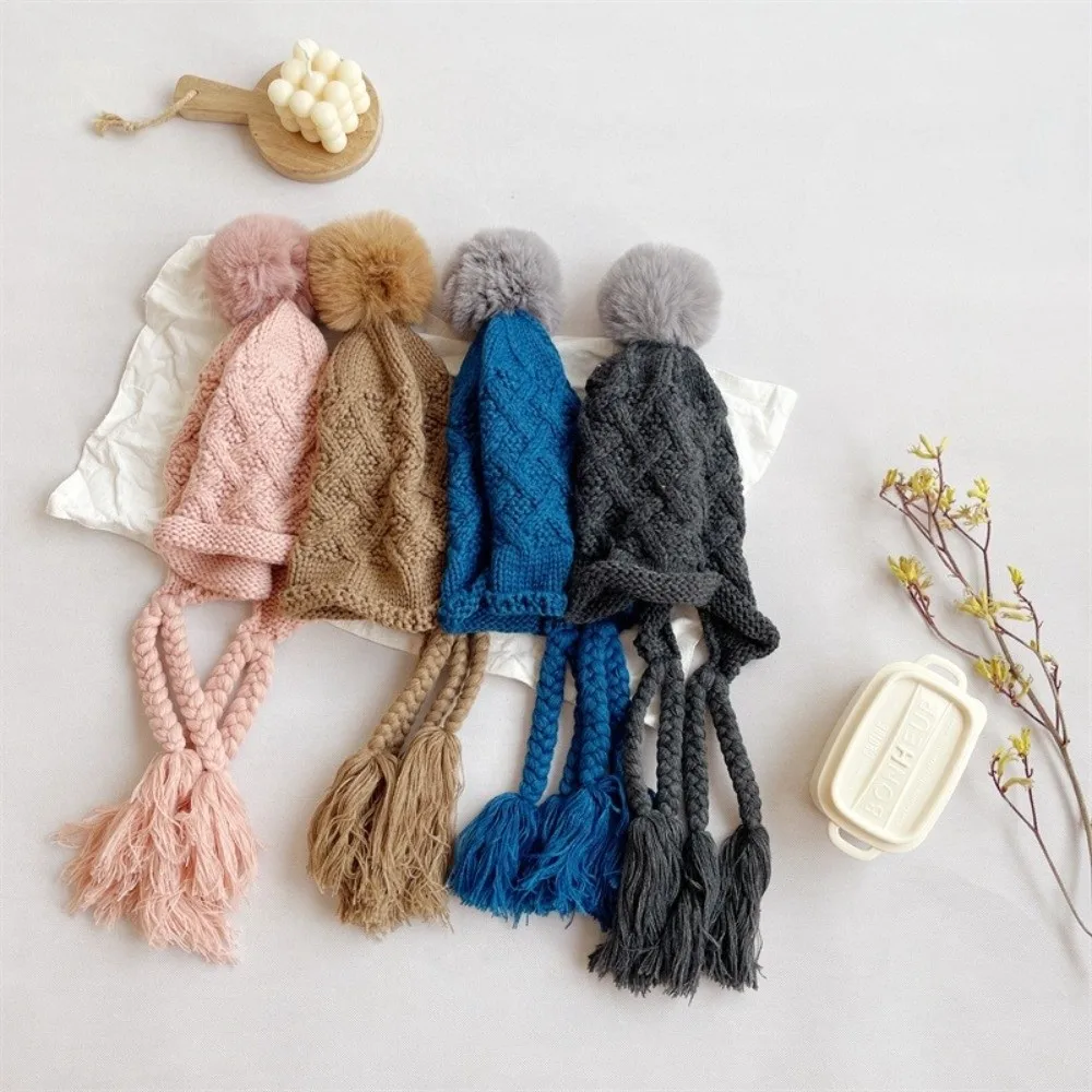 

Korean Autumn Winter Baby Crochet Hat Pom-pom Tassel Pigtail Hand Knitted Cap Soft Warm Outdoor Ear Protection Cap Boys Girls