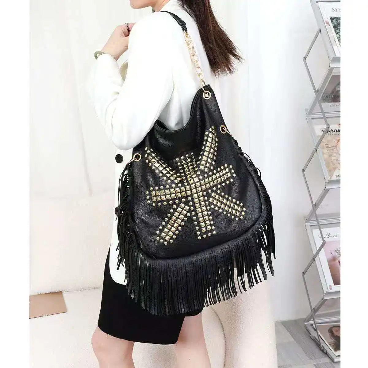 

2026 Fashionable eye-catching multi-purpose stud leather handbag with soft leather fringed strap for single shoulder carrying
