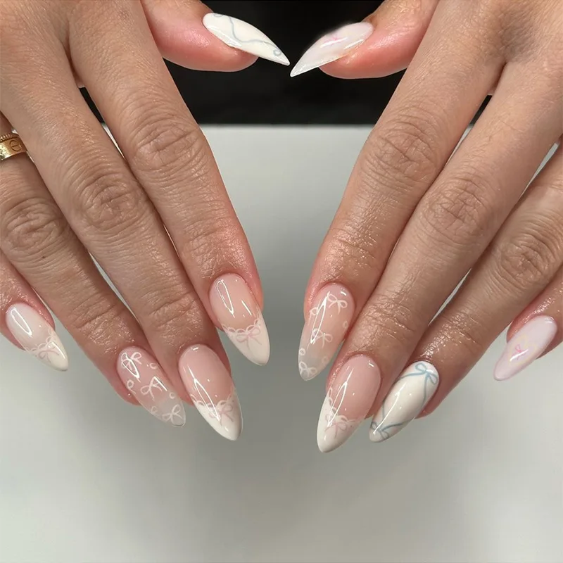 เล็บปลอมแบบกดติด 24 ชิ้น ลายจุดสีดำเรียบง่าย ปิดเต็มเล็บ ทรงอัลมอนด์ ความยาวปานกลาง ประดับโบว์และเพชร