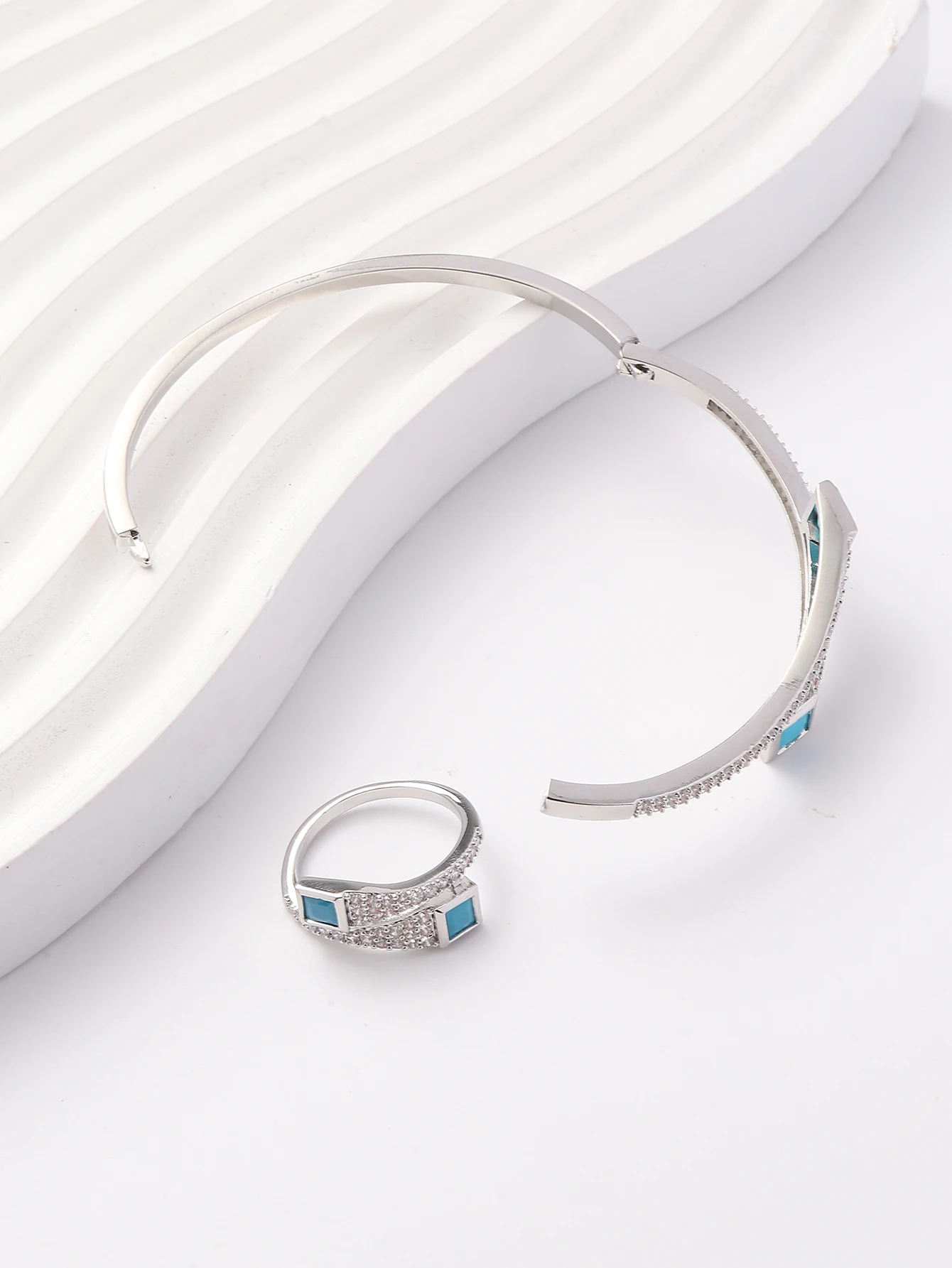 A set of women's new European and American light luxury exquisite trend turquoise zirconium inlaid bracelet ring set