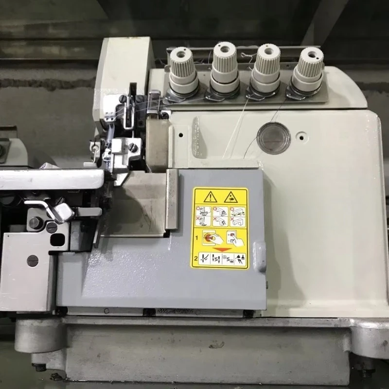 Japan Used 5214 Overlock Sewing Machine for Suits Shirt Garment Iso Standard
