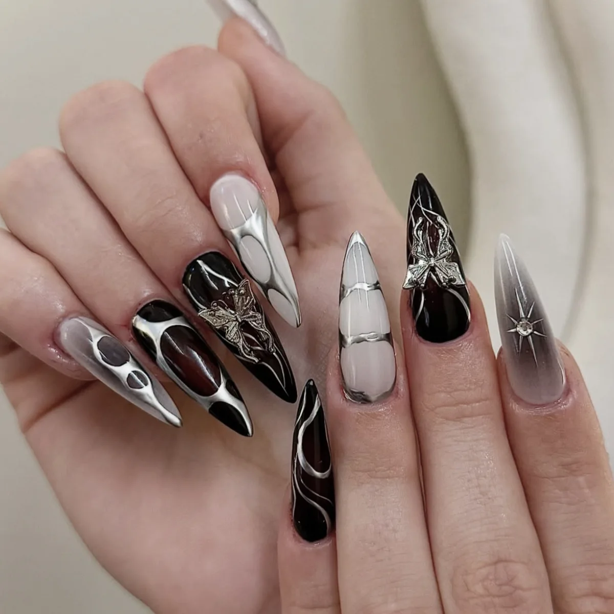 

24Pcs Mid-length Almond Manicure Tips Black Smudge Silver Irregular Line False Nails 3D Butterfly Detachable Press on Fake Nails