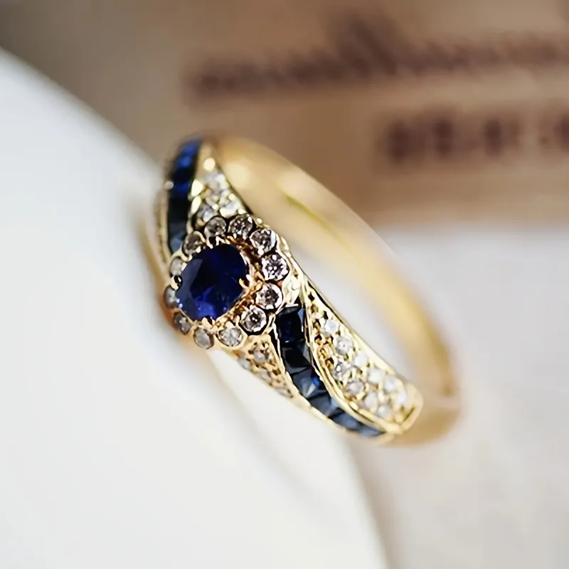 1PC elegant 18K gold-plated copper ring embellished with synthetic sapphire and synthetic zircon, unisex fashion jewelry for everyday wear
