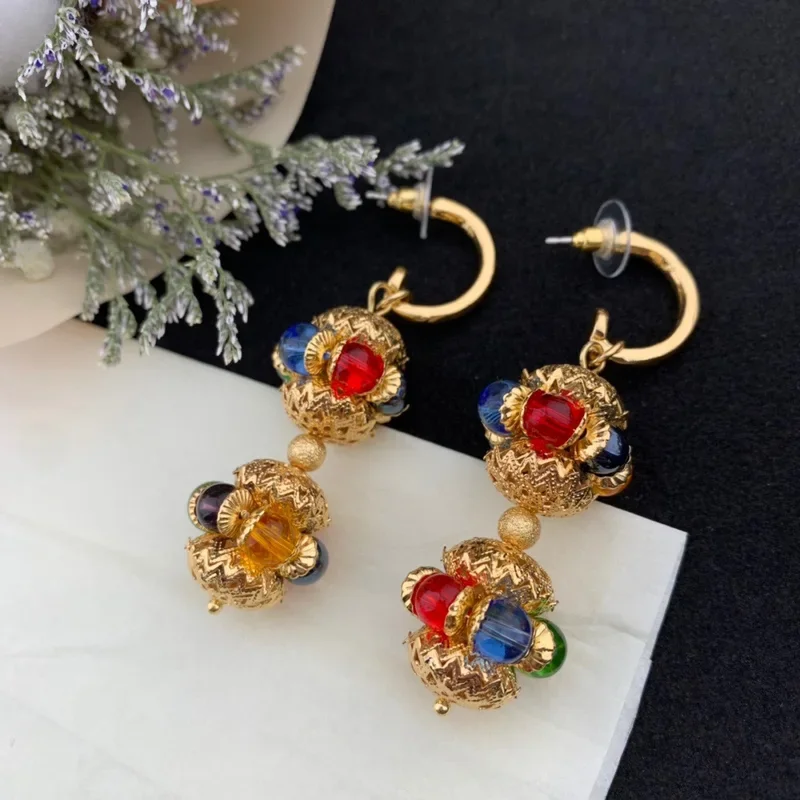 Retro palace style brass gold-plated colored glass earrings three-dimensional circular pendant medieval light luxury style