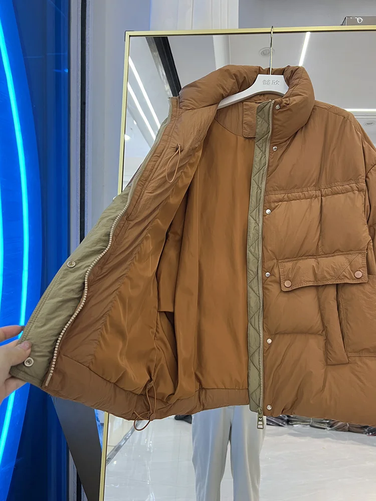 New down jacket women Korean version stand up collar thickened mid length warm loose color blocked white duck down coat