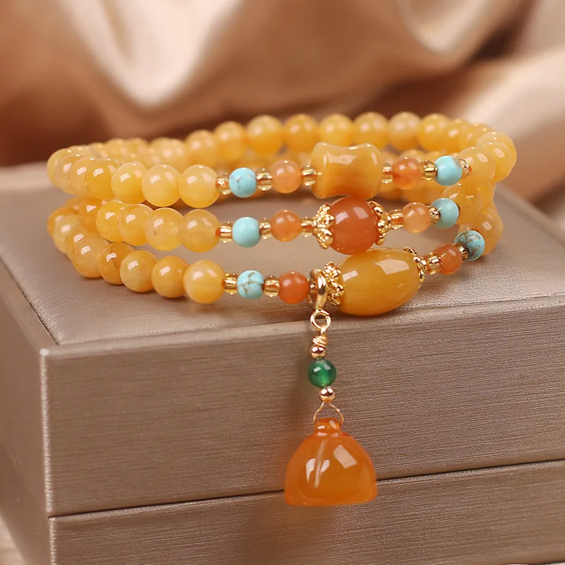 

Multi Layer Wrapped Yellow Crystal Lotus Pod Pendant Bracelet for Women 2026 Gifts