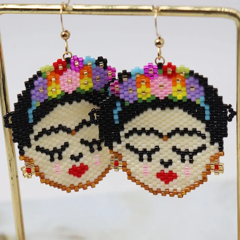 Beaded earrings Beauty Originality Human face Hand knitting Design Bohemia Alloy Fashion Simple Rice bead earrings