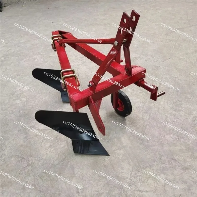 Agricultural small four-wheel horsepower tractor with hanging cultivated land plow and double plow