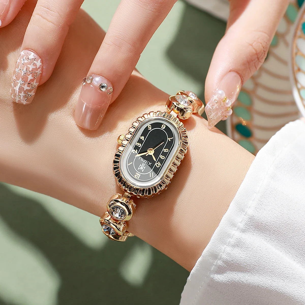 Women's Luxury Crystal Quartz Watch, Oval Black Dial with Diamond Bezel and Gold Tone Band, Casual/Office Wear