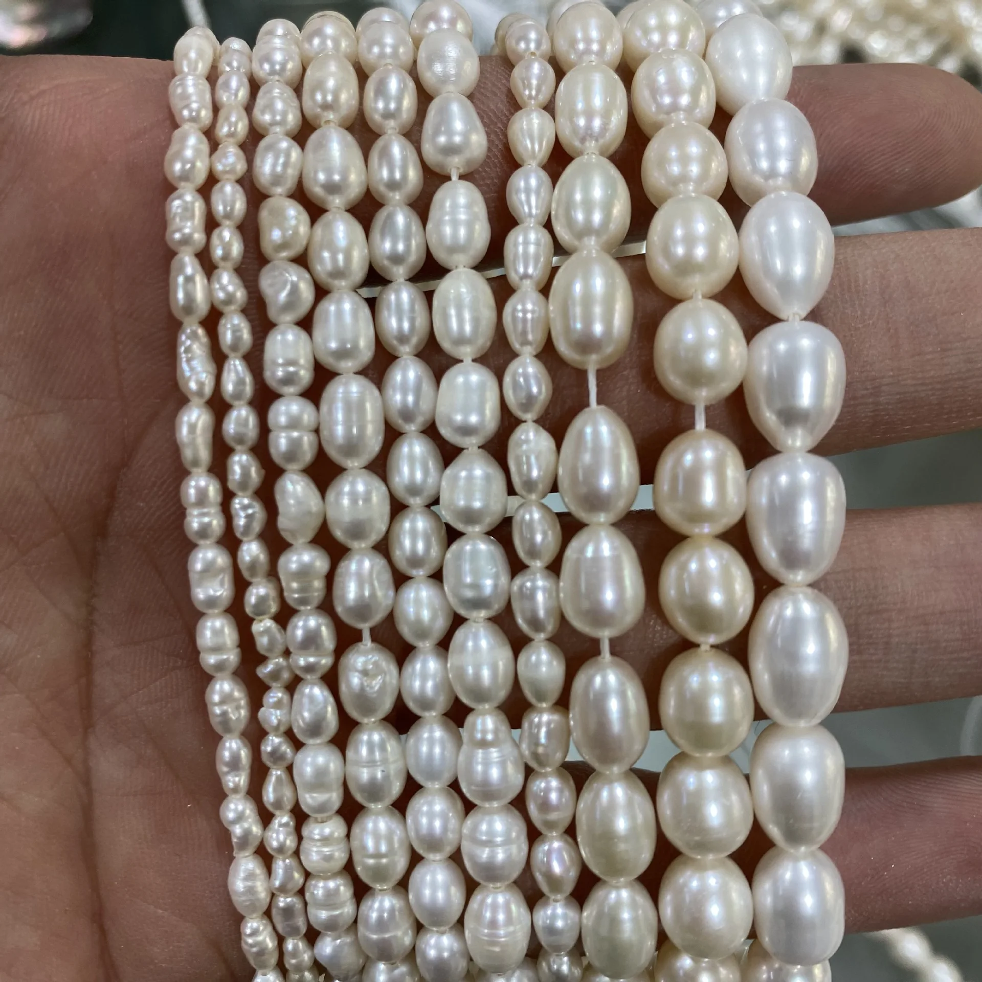 

Wholesale Price Natural Pearl Rice Shape 1A-4A Quality Fresh water Pearl Strand for Fashion Jewelry DIY Pearl Necklace Gifts