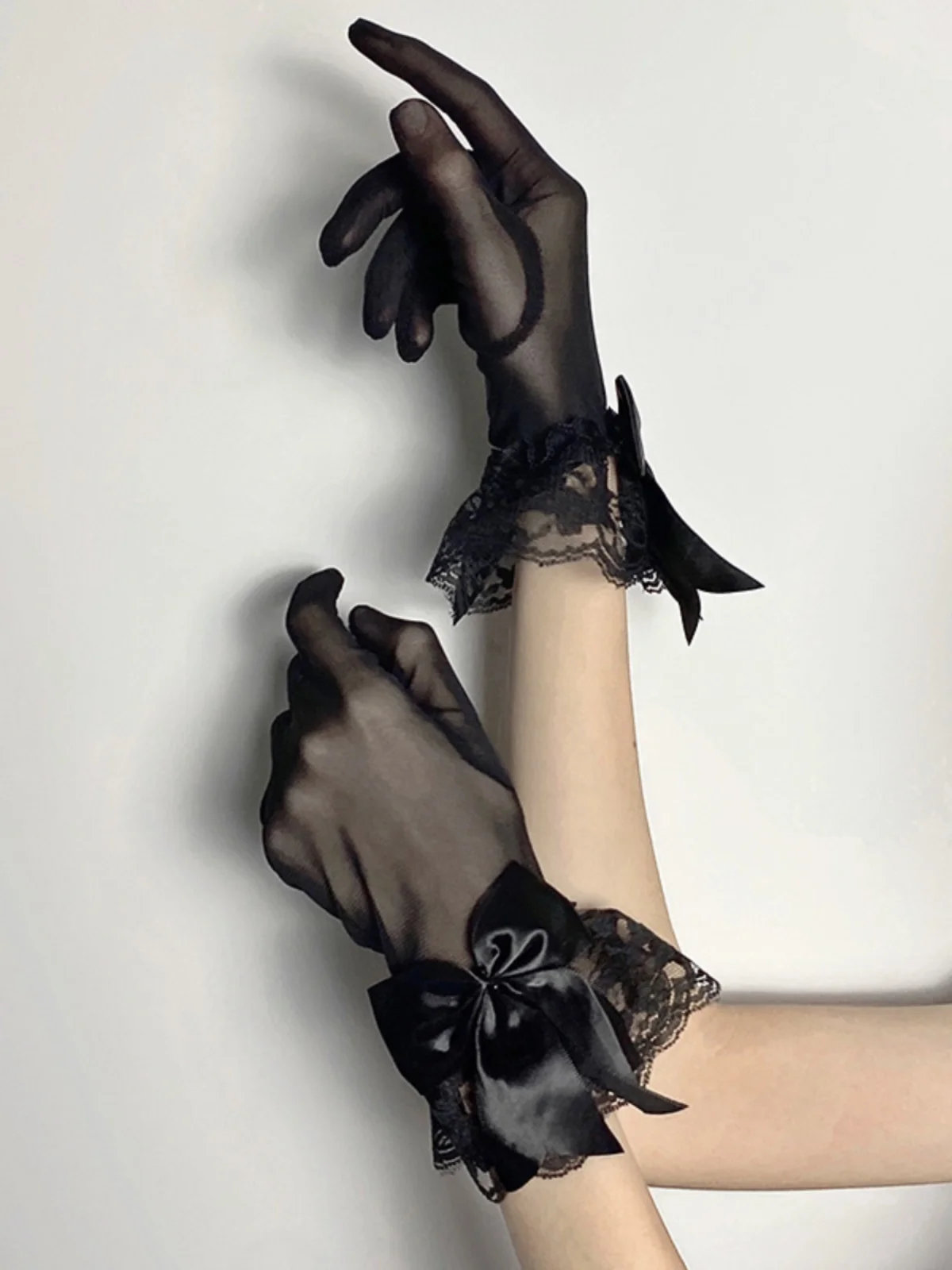 Gants gothiques Lolita avec nœuds en dentelle noire pour femmes