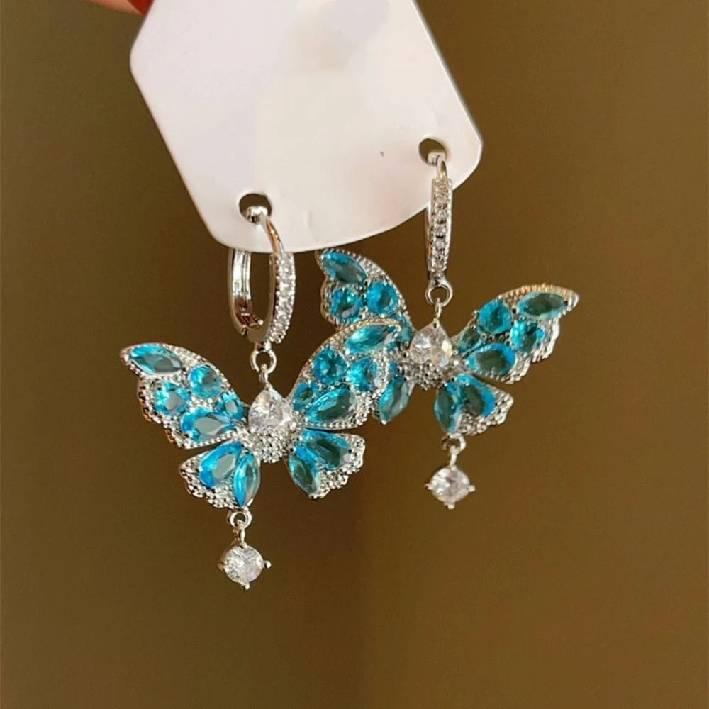 الإبداعية ضوء الفاخرة فراشة كريستال أقراط هوك ثقب الزركون فراشة انخفاض القرط الحلو الأذن مجوهرات اكسسوارات الفتيات
