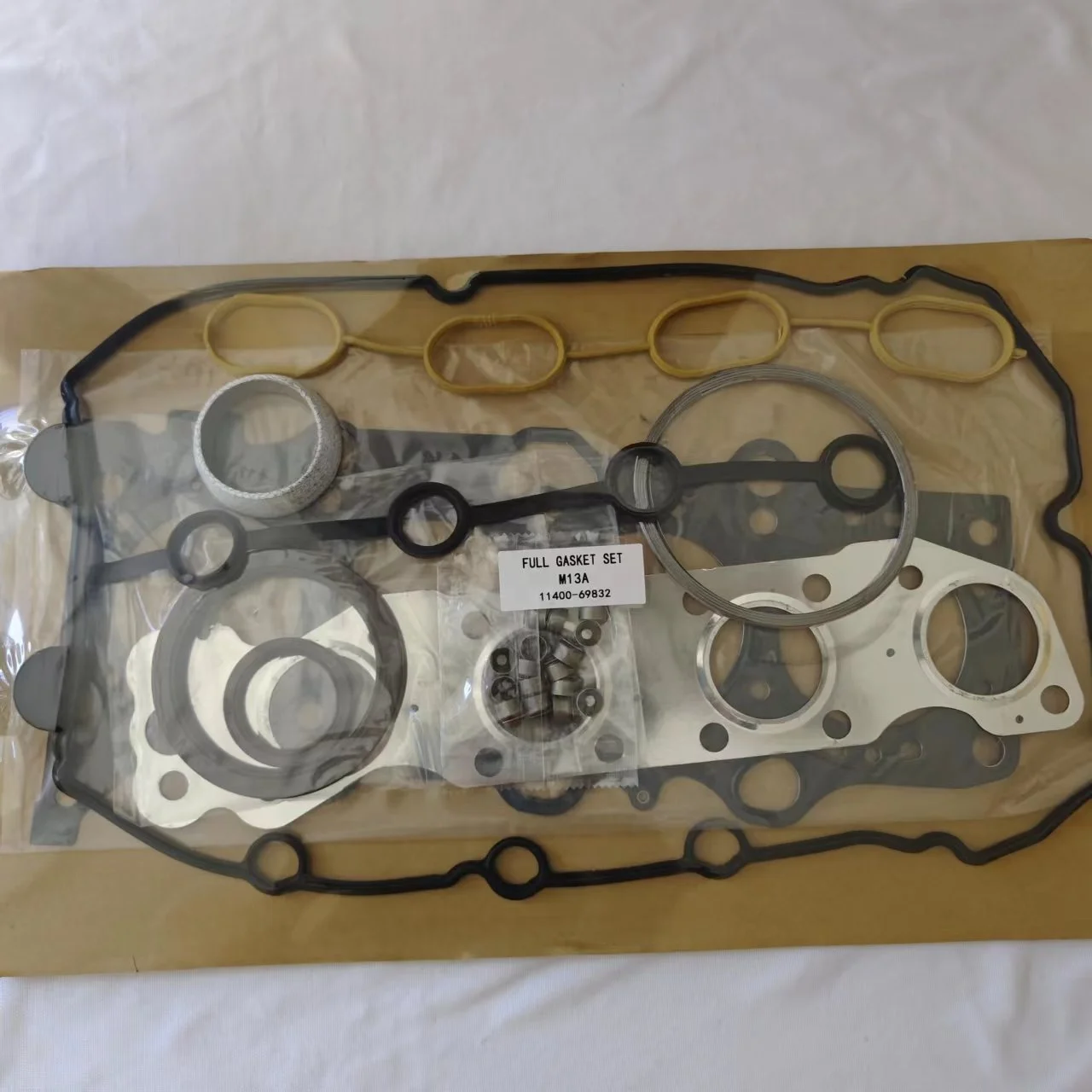 69833 Silindir Kapağı M13A Motor Yuvalama Seti: Suzuki Lgnis Swift İçin Güvenilir ve Dayanıklı Çözüm