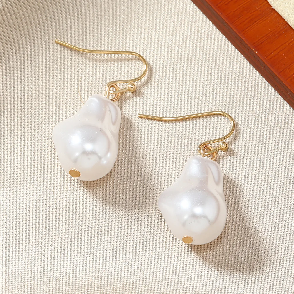 New Korean version simple and versatile irregular pearl baroque style cold wind temperament fringed small earrings women