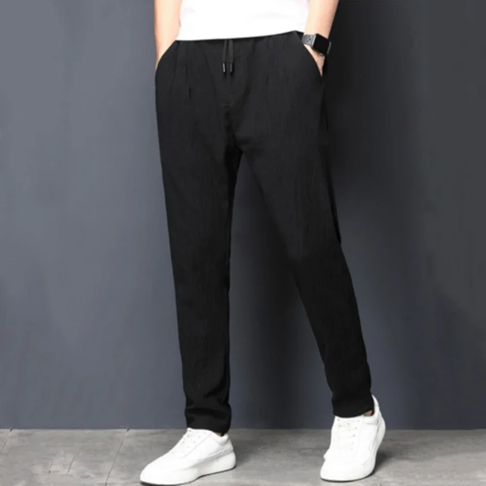 

Men Elastic Waist Loose Straight Leg Sports Jogging Pants Pleated Gym Bodybuilding Workout Fitness Trousers Casual Men's Pants