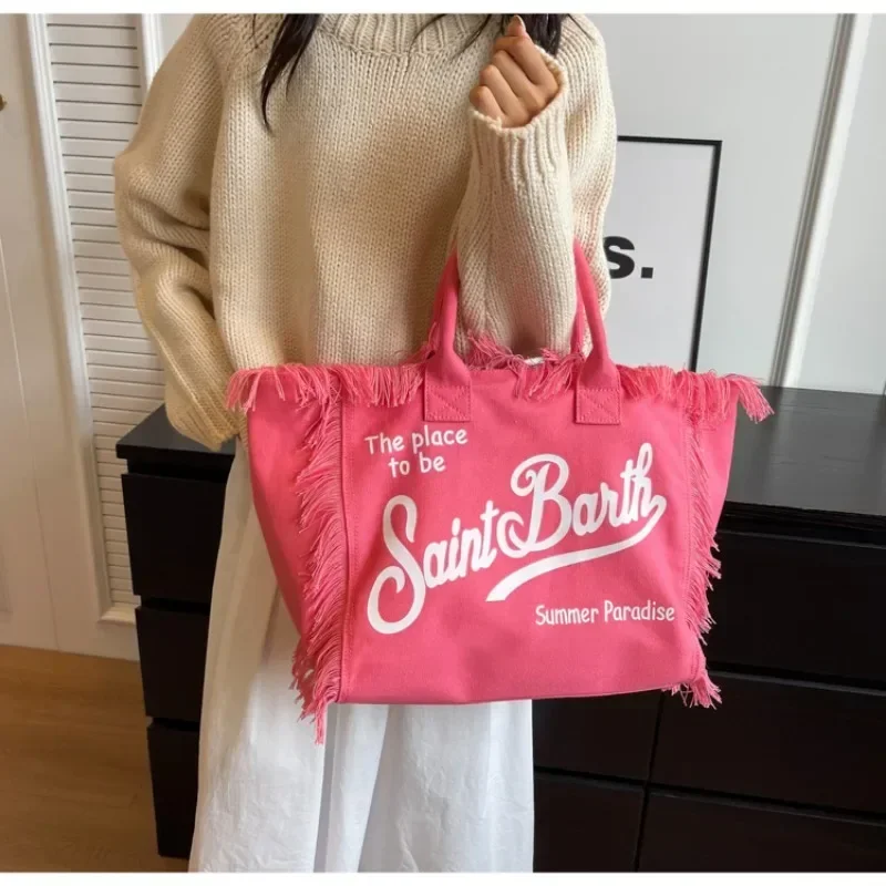 Bolso de hombro de lona para mujer, bolsa versátil de gran capacidad, diseño informal con borlas, gran oferta, 2024