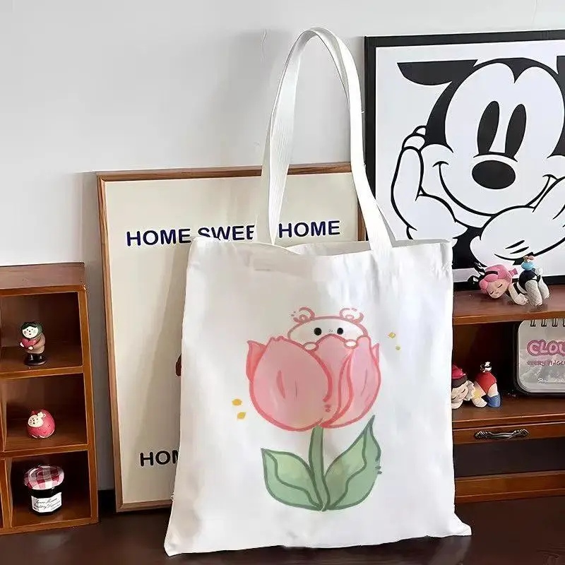 

2026 Tulip canvas bag with a strap - large capacity, suitable for office commuters, with a shoulder strap on the outside