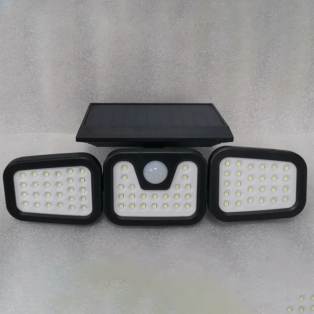 2000LM 74LED พลังงานแสงอาทิตย์กลางแจ้ง Motion Sensor การเหนี่ยวนําของมนุษย์ปรับหัว IP65 กันน้ําโคมไฟติดผนังพลังงานแสงอาทิตย์โคมไฟพลังงานแสงอาทิตย์