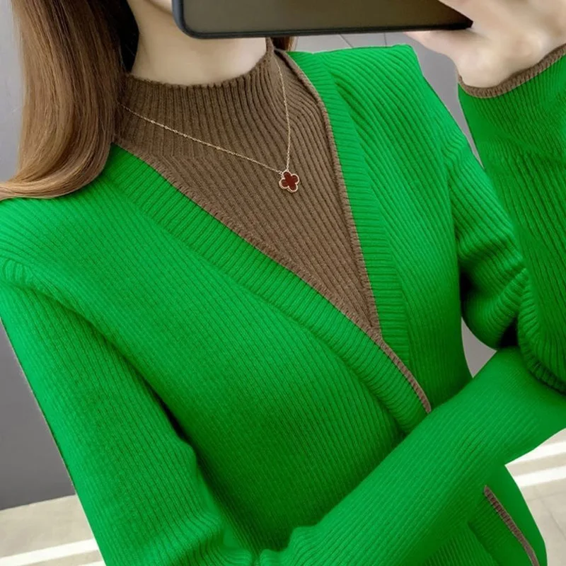 Moda medio cuello alto empalmado falso dos piezas suéteres ropa de mujer 2022 otoño nuevos suéteres sueltos de viaje Casual Tops