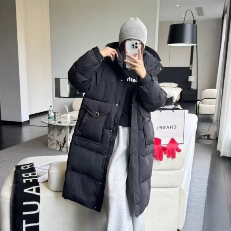 Chaqueta larga de plumón para mujer, moda de invierno 2025, estilo viajero, abrigo cálido adelgazante versátil y grueso elegante a la moda