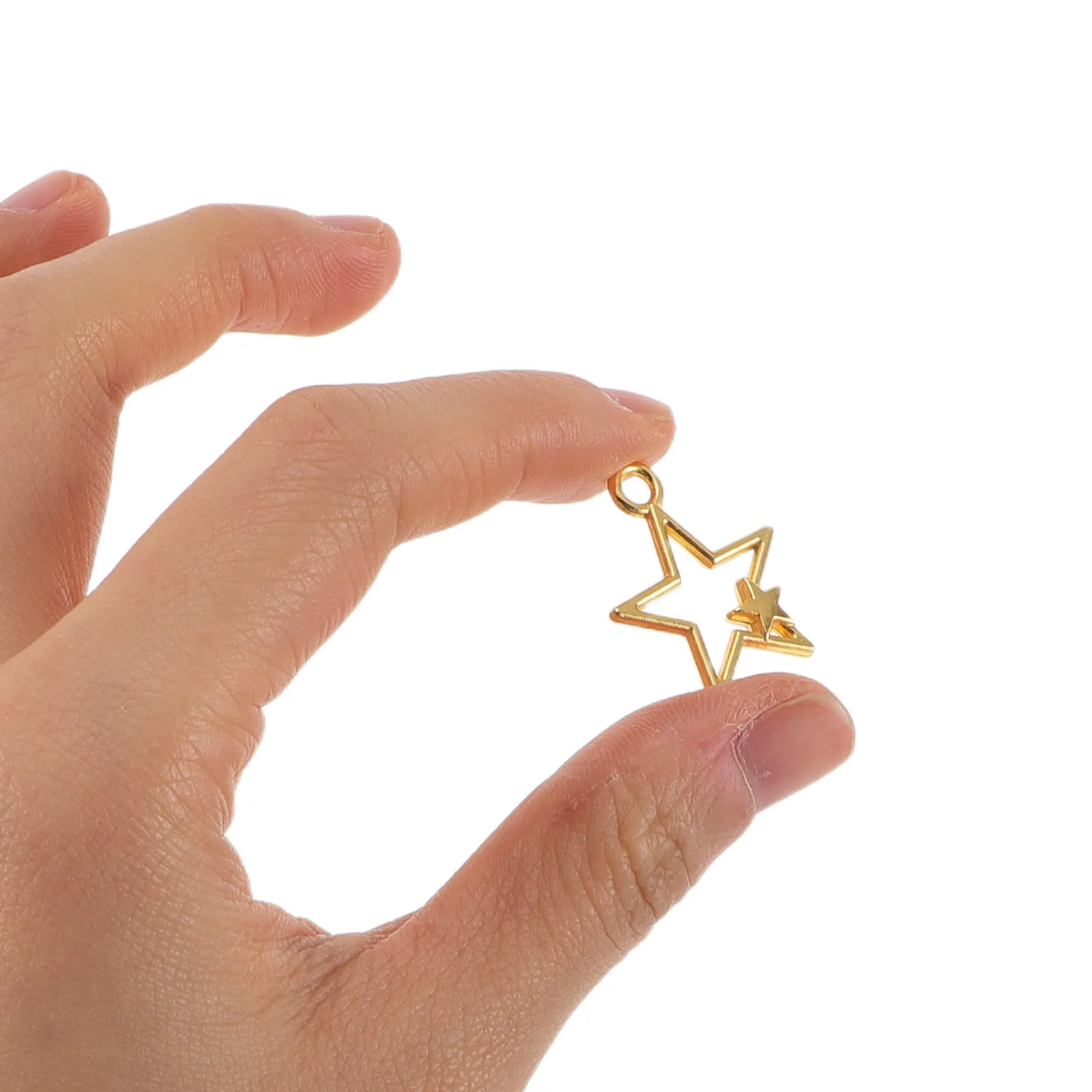 

100Pcs Golden Hollow Star Pendants Mini Metal Charms for Jewelry Making Star Shape Charms DIY Necklaces Bracelets Earrings