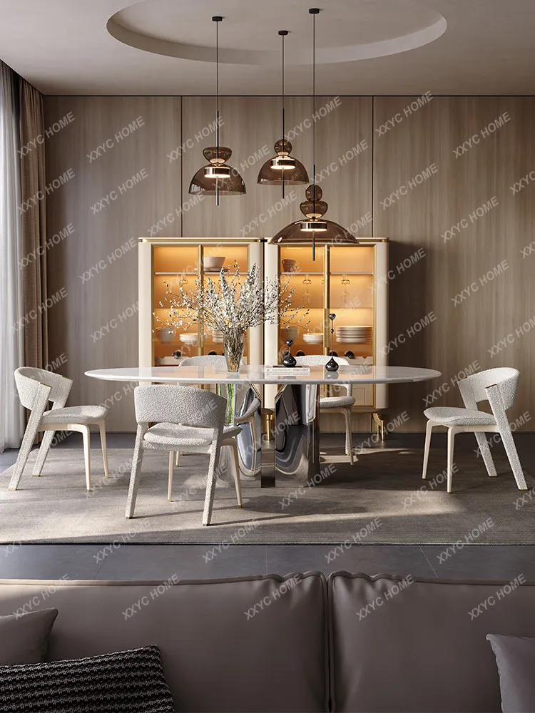 Dining table light luxury high-end marble pure natural luxury stone Fendi white water drop-shaped dining table and chairs villa
