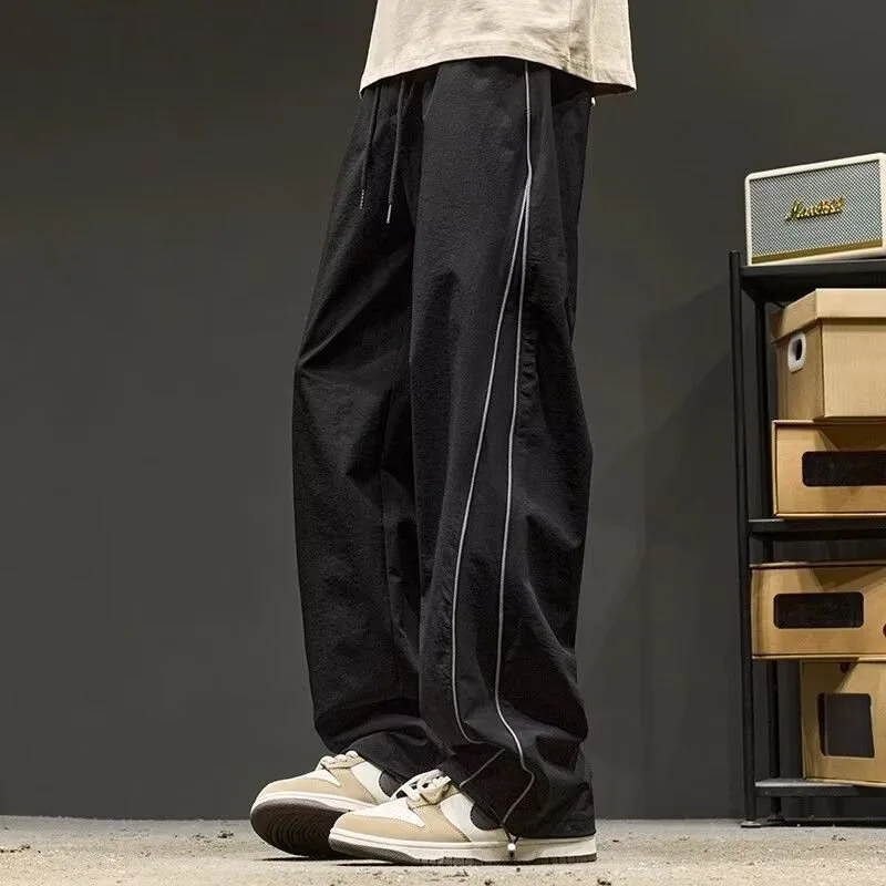 

Новые летние модные мужские однотонные простые базовые повседневные модные свободные широкие брюки-карго с прямыми шнурками мужские брюки