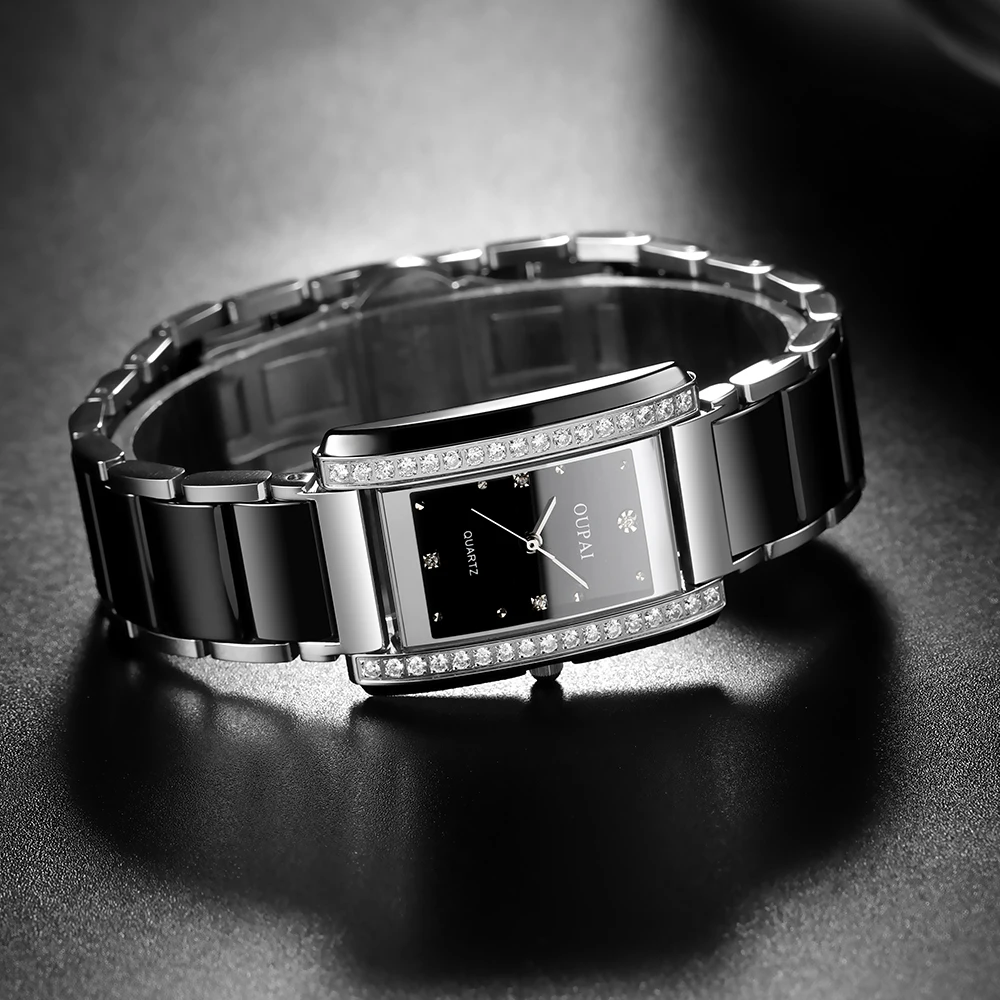 ساعة Oupai مستطيلة للنساء سوار أسود من حجر الراين كوارتز حركة عصرية وبسيطة ساعة يد رائعة مقاومة للماء