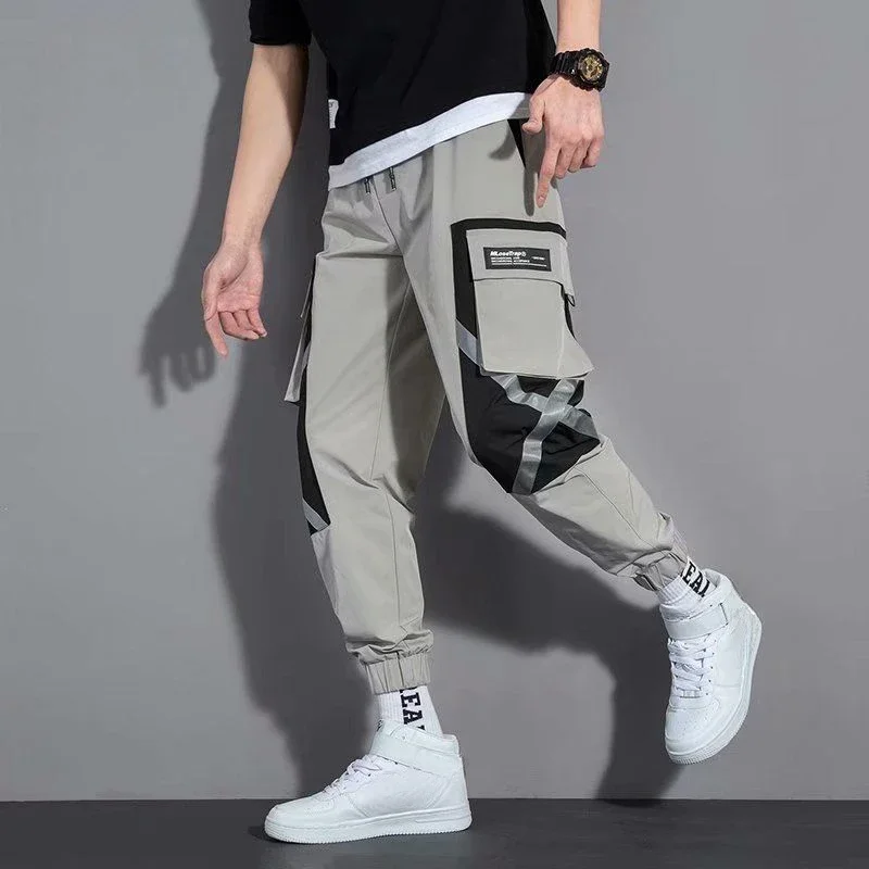 Pantaloni maschili Harem Hip Hop Multi tasca estate multitasche Splicing pantaloni Cargo da uomo Spandex abbigliamento Vintage Nylon lungo Emo