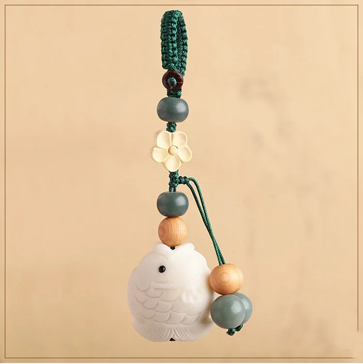 

Year After Year Ivory Fruit Fine Carving Small Fish Car Key Chain Hand Woven National Style Art Pendant Men's and Women's Gifts