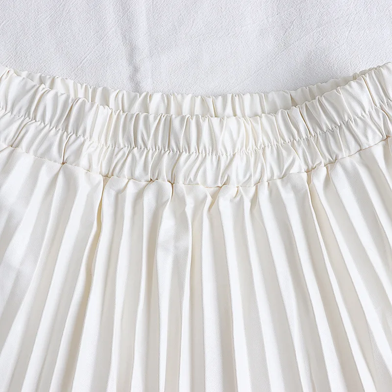 Nieuw in dames herfst winter effen kleur PU-leer geplooide taille A-lijn midi lange rok kantoor dame elegante losse rokken