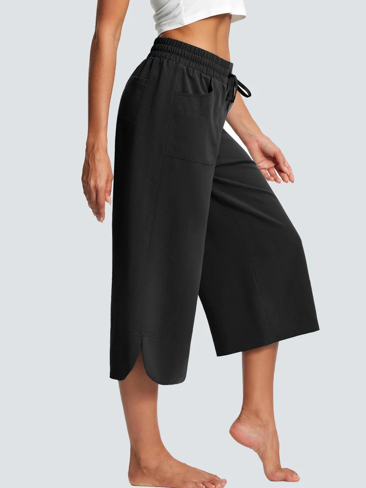 سراويل نسائية صيفية قابلة للتمدد مستقيمة الساق واسعة الساق لعام 2025 ، ملابس خارجية غير رسمية من الحرير الجليدي بسبعة سنتات ، فضفاضة ومسامية