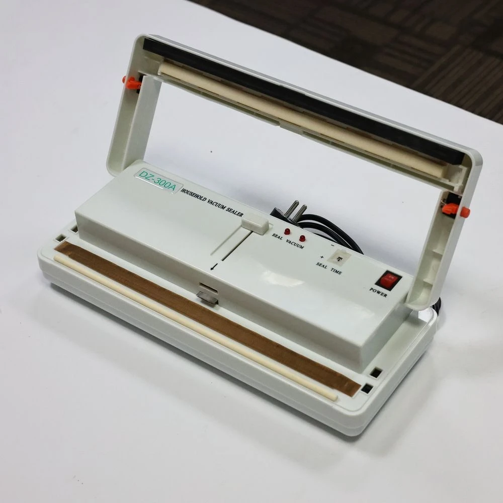 

Коммерческая машина в стиле машины, вакуумный небольшой размер, стол, бытовой герметик, вакуумный пакет, пищевая вакуумная упаковка DZ-300A