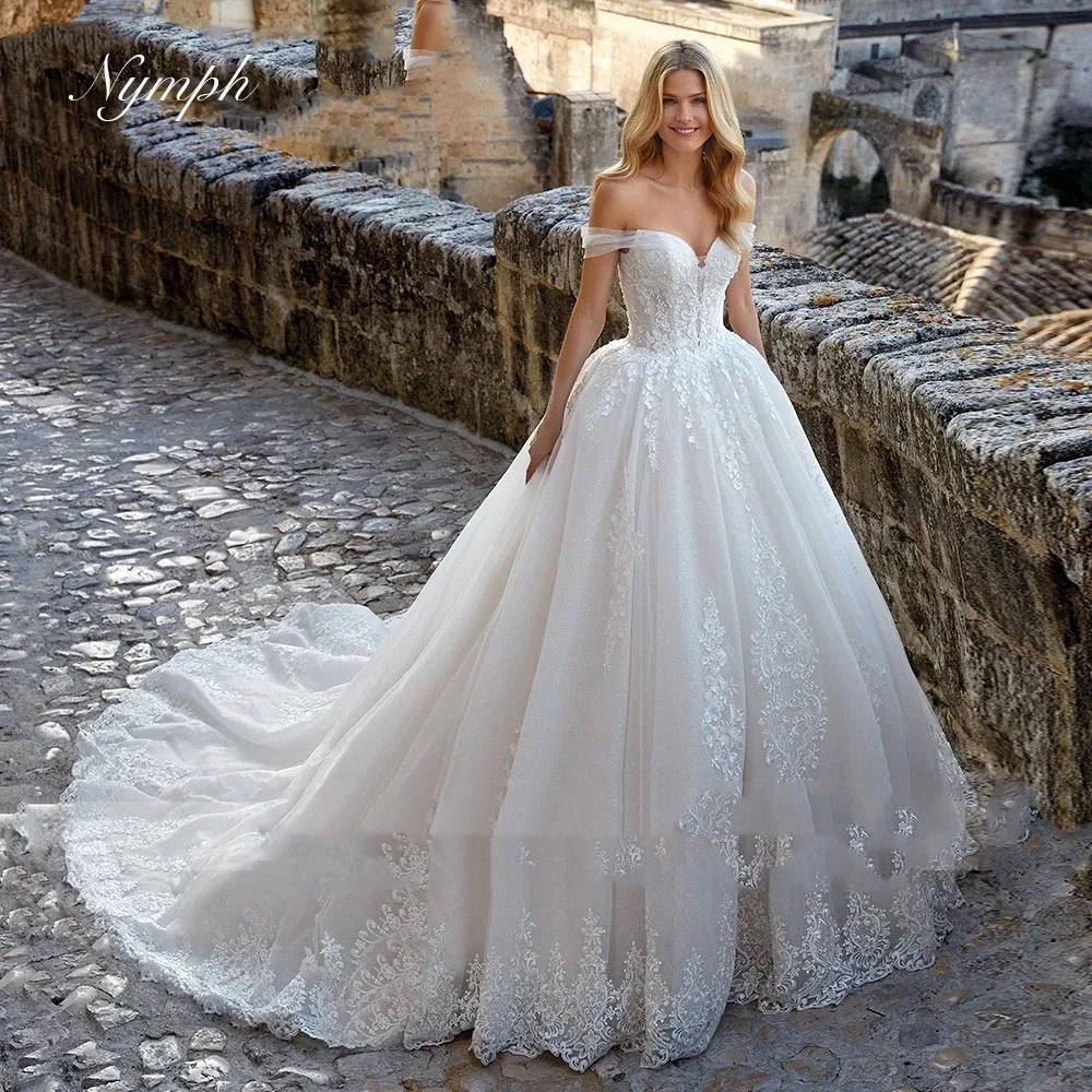 

Customized Ball Gown Wedding Dresses For Women Vestidos De Novia Sweetheart Appliques Sequined Wedding Gown Sweep Train