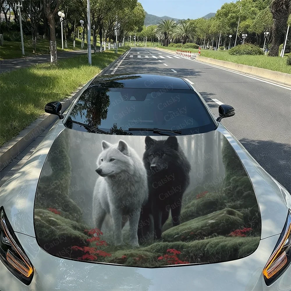 

Elegant car hood design featuring a white and black wolf duo amidst lush greenery, perfect for nature lovers.Car stickers