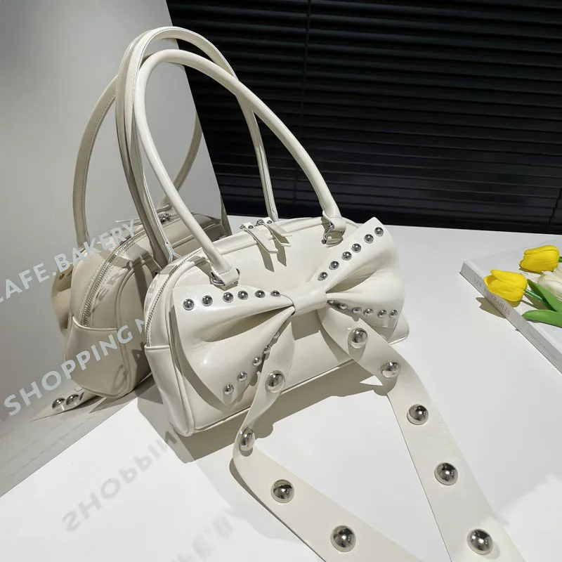 European and American hot girl style hand-held bowling bag 2025 new fashion personality rivet shoulder bag motorcycle girl