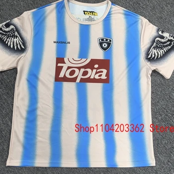 Real Photo สีฟ้าสีขาวลาย CACTUS JACK แขนสั้นตาข่าย Tee แฟชั่นรูปแบบตัวอักษรใหม่ Eagle พิมพ์ UTOPIA เสื้อยืด