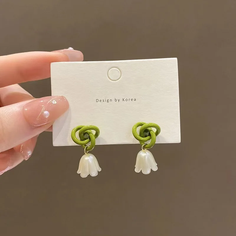 S925 small fresh temperament winding lily of the valley earrings women's ins tide simple and versatile forest stud earrings